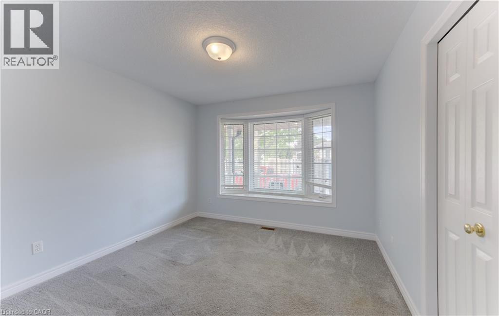 25 Bankside Drive Unit# 2, Kitchener, Ontario  N2N 3M6 - Photo 2 - 40865039
